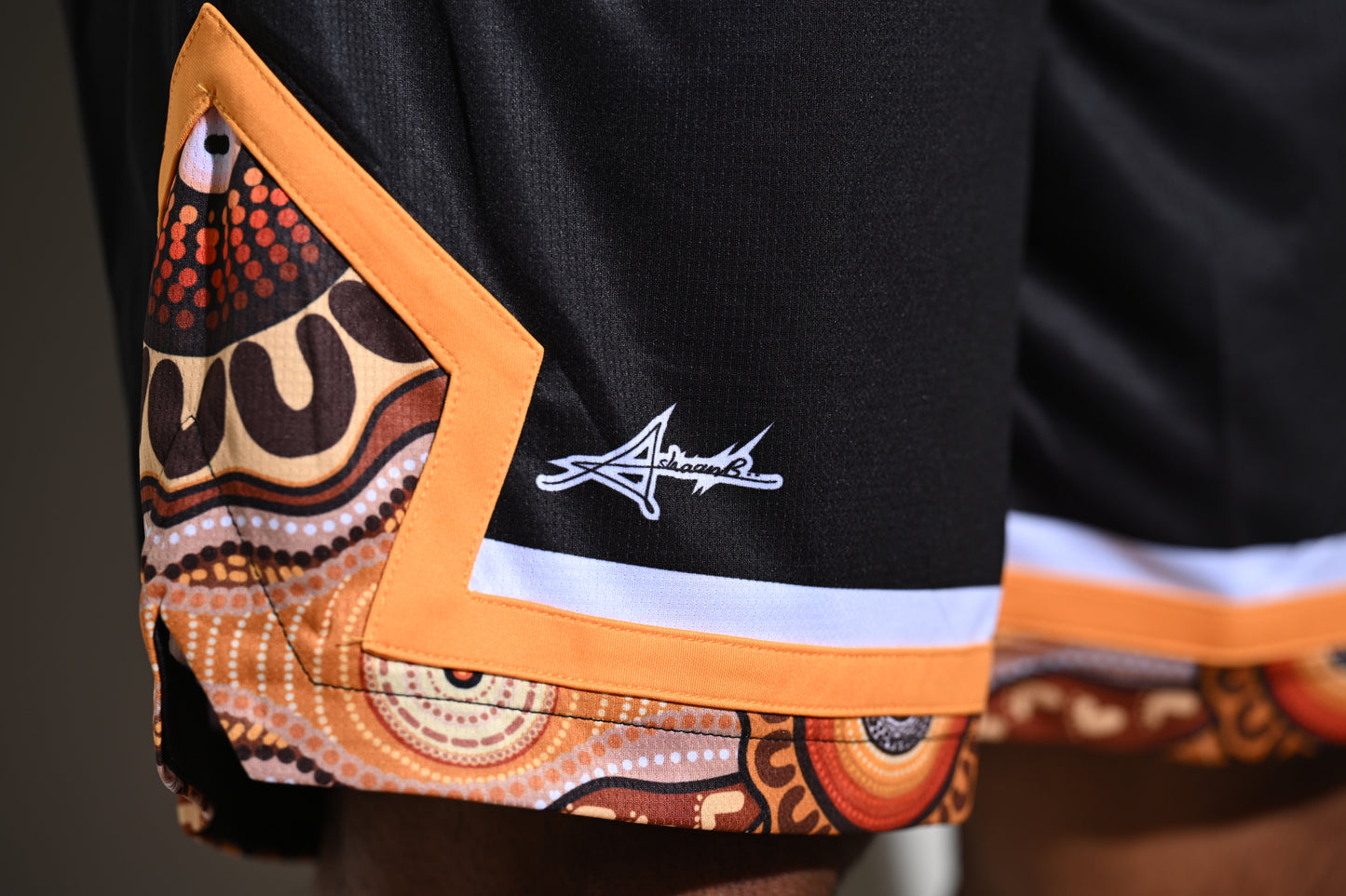 Intergenerational learning & sharing on Country Basketball Shorts